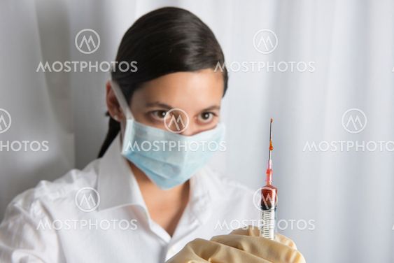 Beautiful women holding syringe