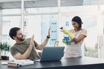 Spring cleaning, couple and fun with spray, home and...