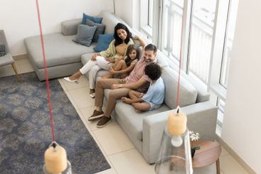 Couple with little siblings spend carefree leisure at...