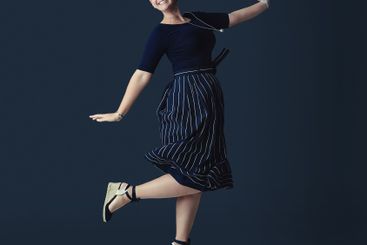 Portrait, business and woman with celebration, jumping...