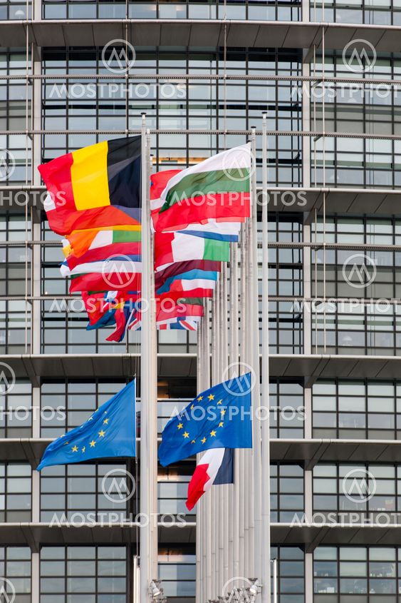 European Union Flags and France flag flies at half-mast
