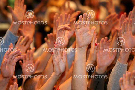 raised up a human hands at the event