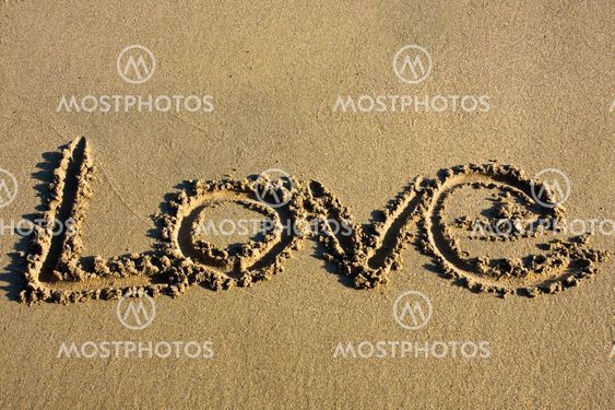 love message written in sand