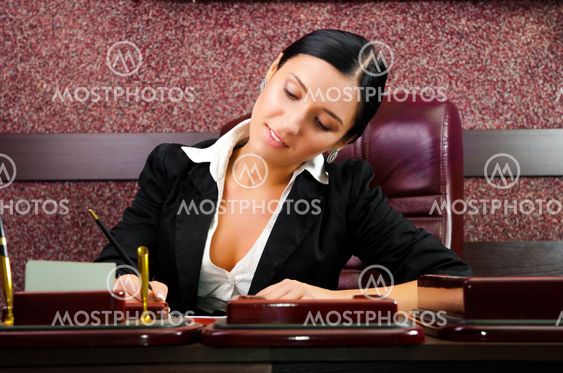 young businesswoman working with documents