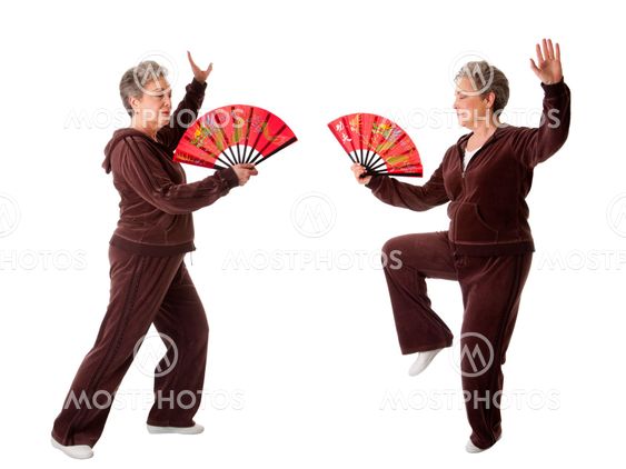 Senior woman doing Tai Chi Yoga exercise