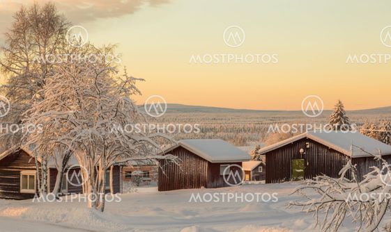 Sunset over winter landscape in Nilivaara, Sweden