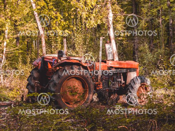 Zoom on an abandoned tractor