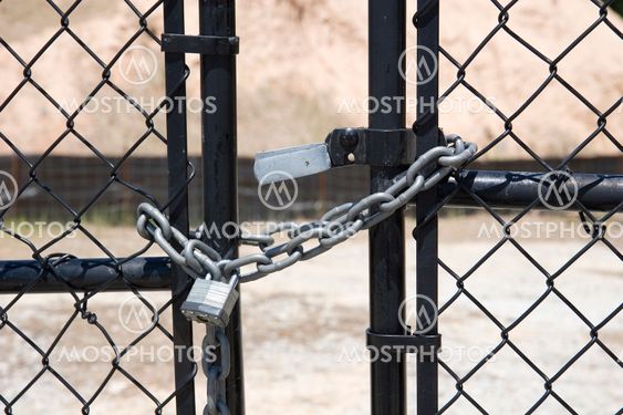Silver Lock and Chain on Black Gate