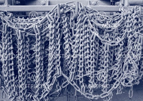 Industrial gray chains hanging on a truck