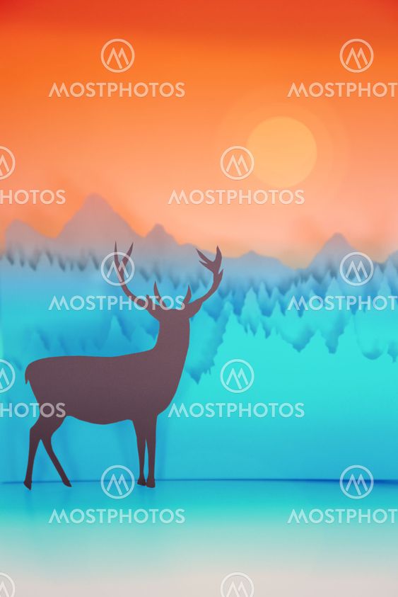 Paper cut handmade winter deer holiday card sunset