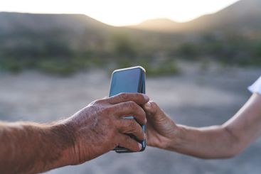 Closeup, people and hands with mobile for connectivity,...