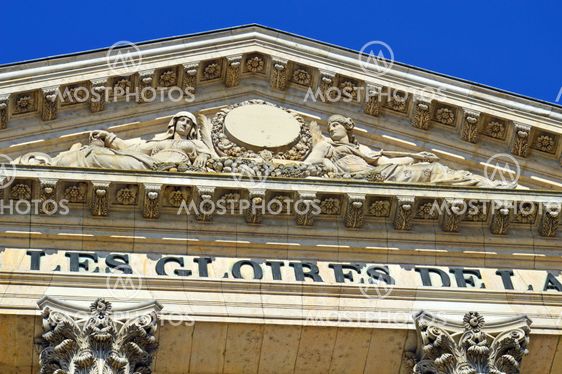 Ornamented buildings of the Royal Chapel in front of the Palace of Versailles, France