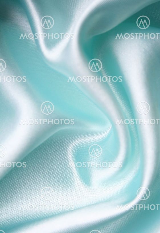 Smooth elegant blue silk as background