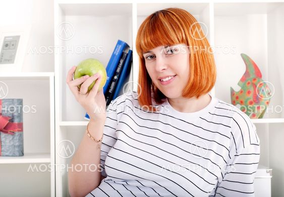 portrait of woman with apple