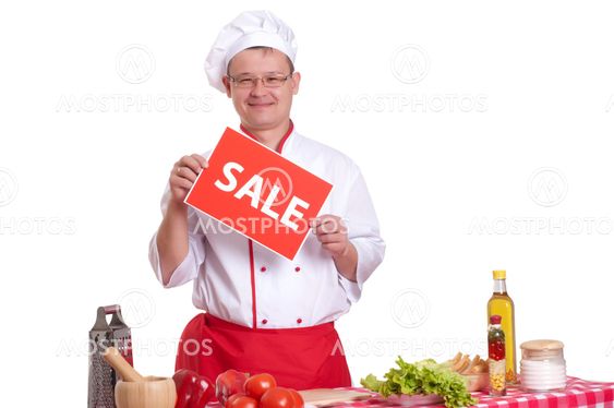 Chef holding a sign with an inscription Sale