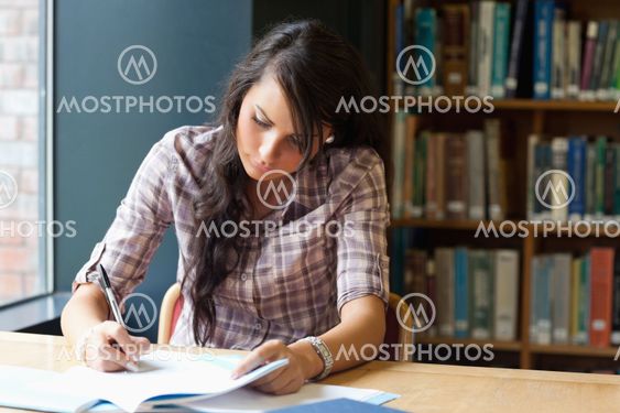 Young student writing