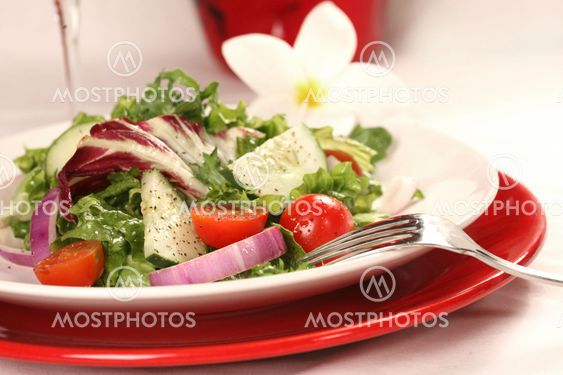 Healthy Salad on a Red Plate