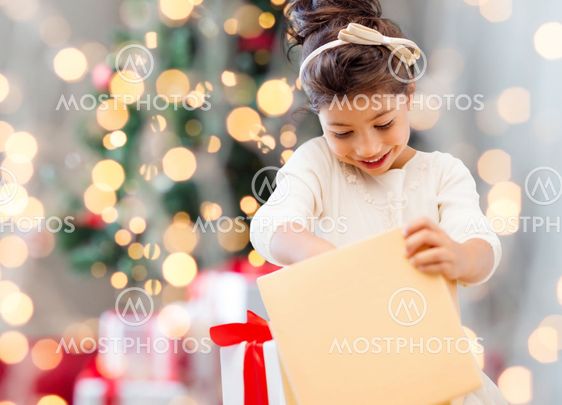 smiling little girl with gift box