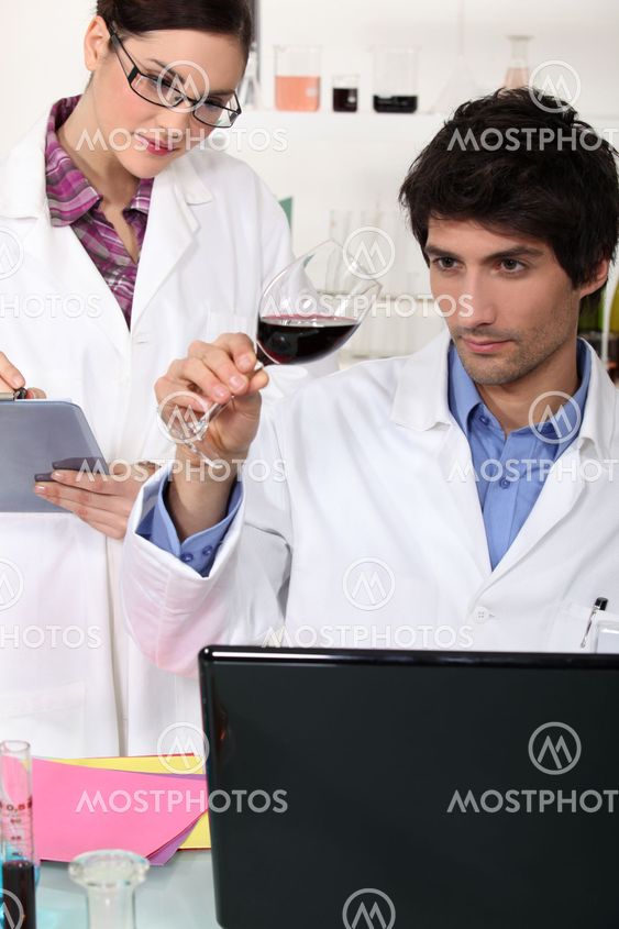 oenologists in a lab