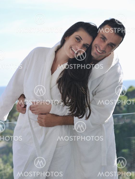 couple relaxing on balcony