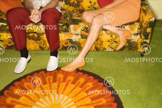 Couple on sofa.