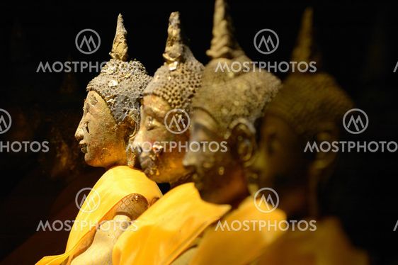 Depth of field, light on the Buddha.