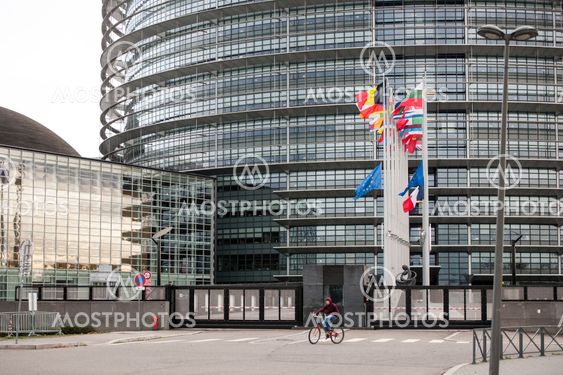 European Union Flags and France flag flies at half-mast