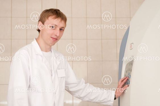 Doctor with CT scan films