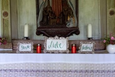 Religious and Christian objects and candles on the...