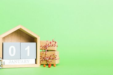 1 january. Christmas composition on colored background...