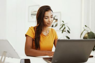 Remote work, thinking and laptop with woman typing in...