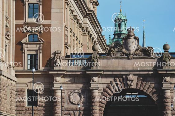 Details of art and decor on Building of The Parliament House of Sweden built in Neoclassical style, with a centered Baroque Revival style facade section, located on nearly half of Helgeandsholmen island, in the Gamla stan, old town Stockholm