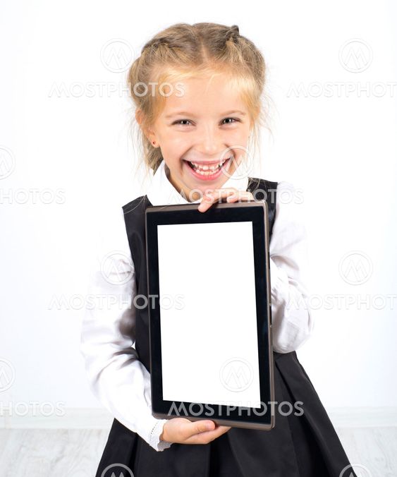 cute schoolgirl with a pc tablet