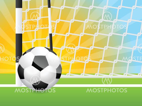 Soccer ball near gate with sunset background