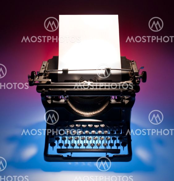 Vintage typewriter and paper