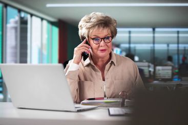 Chartered Accountant Female Making Phone Call Talking