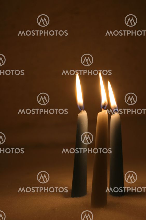 Closeup of burning candles