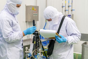 Environment officer setting WBGT measurement of ambient...