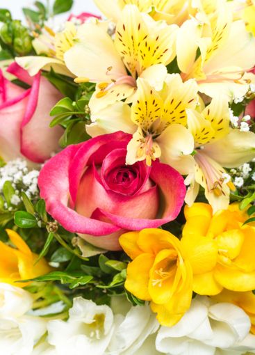 Colorful bouquet of roses, lilies, and other flowers...