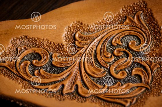 embossed pattern on the leather in the workshop