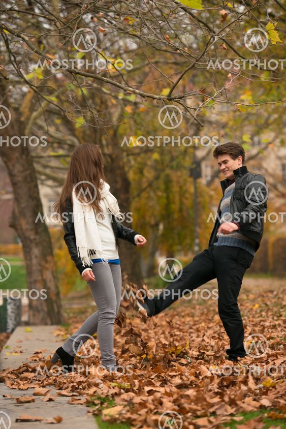 Happy young Couple in Autumn Park