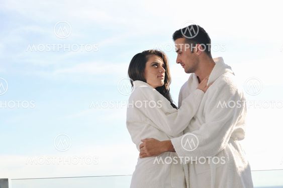 couple relaxing on balcony