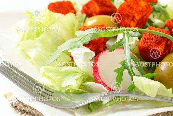 Fresh vegetable salad with diced cheese