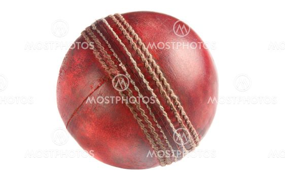 An old used red cricket ball, isolated on a white background.