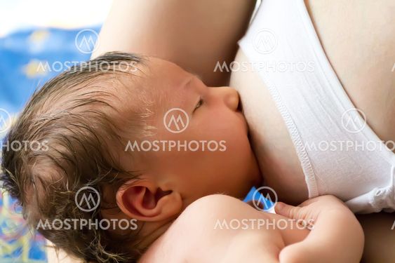Sleeping eating cute newborn