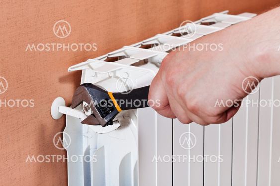 adjusting heating radiator