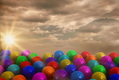 Composite image of colourful balloons
