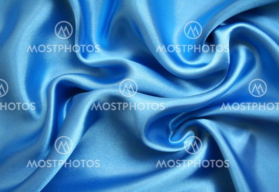 Smooth elegant blue silk as background
