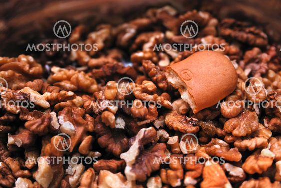 Shreddered nuts and half of a cookie