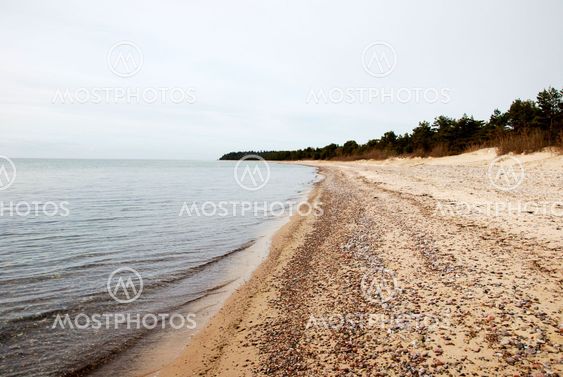 Pebbles at a sandy beach